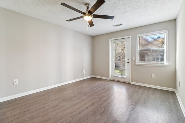 Comfortable spaces feature ceiling fans, hardwood flooring, and direct access to your private balcony, professionally operated by Highlands Vista Group.