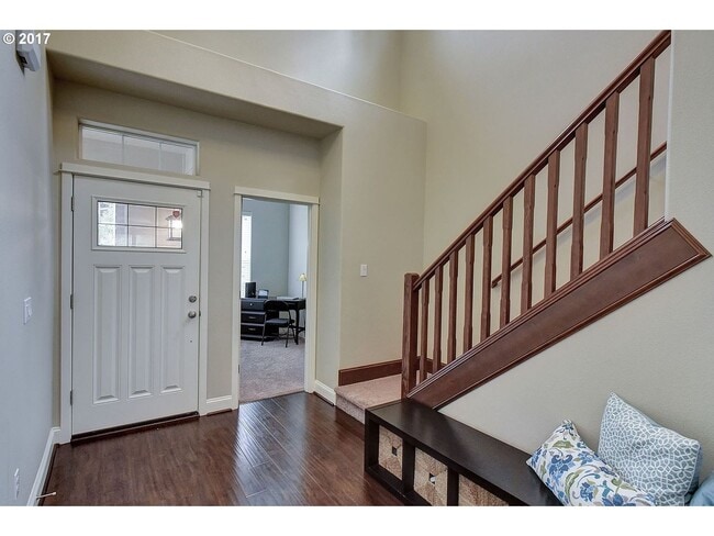 Photo - Bright and Open Floor Plan with Fireplace, Attached Garage & Vaulted Ceilings