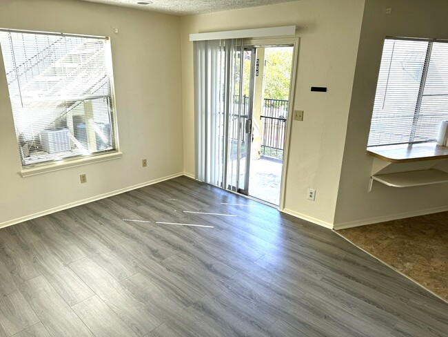 Living Room and Entry Door - 217 Ramsay St Apartments Unit #306