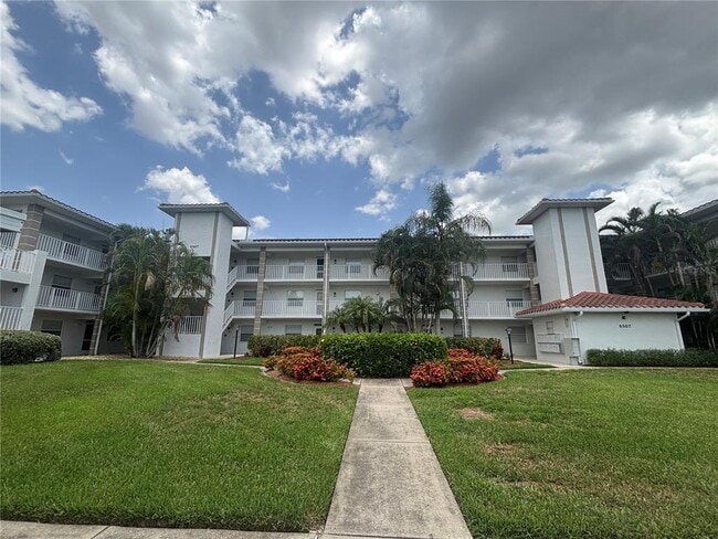 Building Photo - 6507 Stone River Rd Unit 105