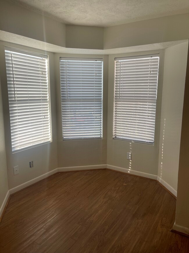 Bay window in living room - 4441 Old College Rd Unit #4201