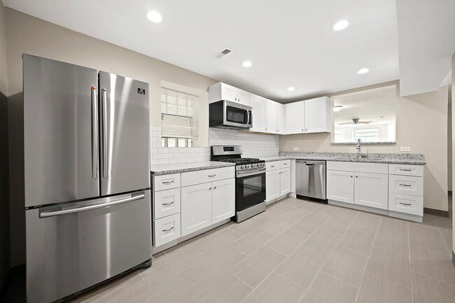 Spacious 2BR, 2BA Haven with Hardwood Elegance right across from Humboldt Park!