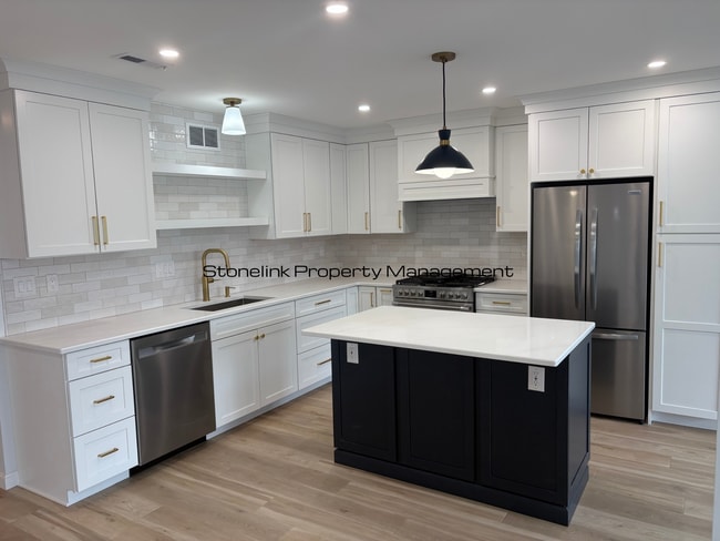 Photo - Fully Redesigned Townhouse Style Condo For Rent in Desirable Louisquisset Community!