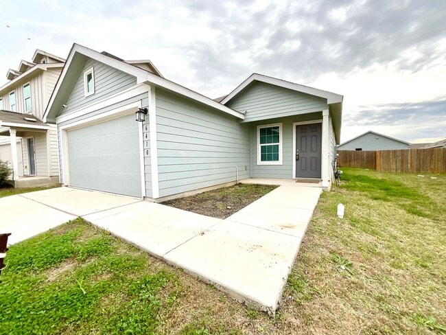 Photo - **APPLICATION RECEIVED** **MOVE IN SPECIAL** Beautiful 4BR/2BA Home with Fenced Yard & Garage!