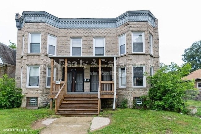 Building Photo - 7642 S Normal Ave Unit 1