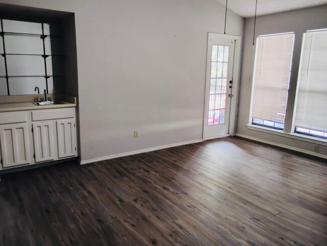 Wet Bar and Living Room - 1202 Thorpe Ln Unit 216