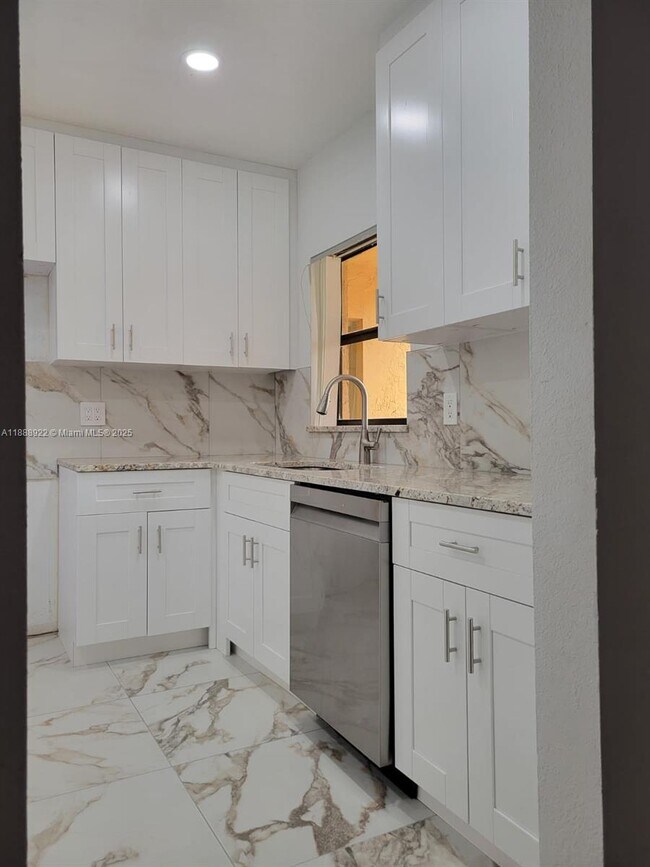 Photo - 3883 Coral Tree Cir Unit 3883