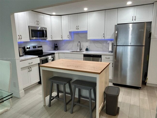 Building Photo - 19390 Collins Ave Unit 118