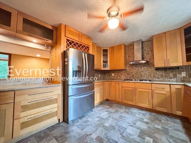 Photo - Beautiful 4 Bed/3 Bath Home with 3 Car Garage / Available Now!