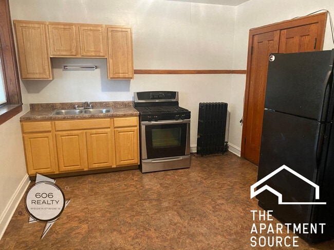 Building Photo - 5357 W Belmont Ave Unit 3