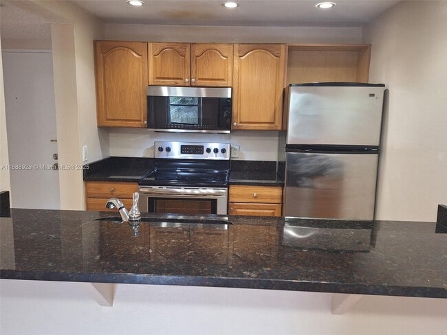 Building Photo - 8180 Geneva Ct Unit 224