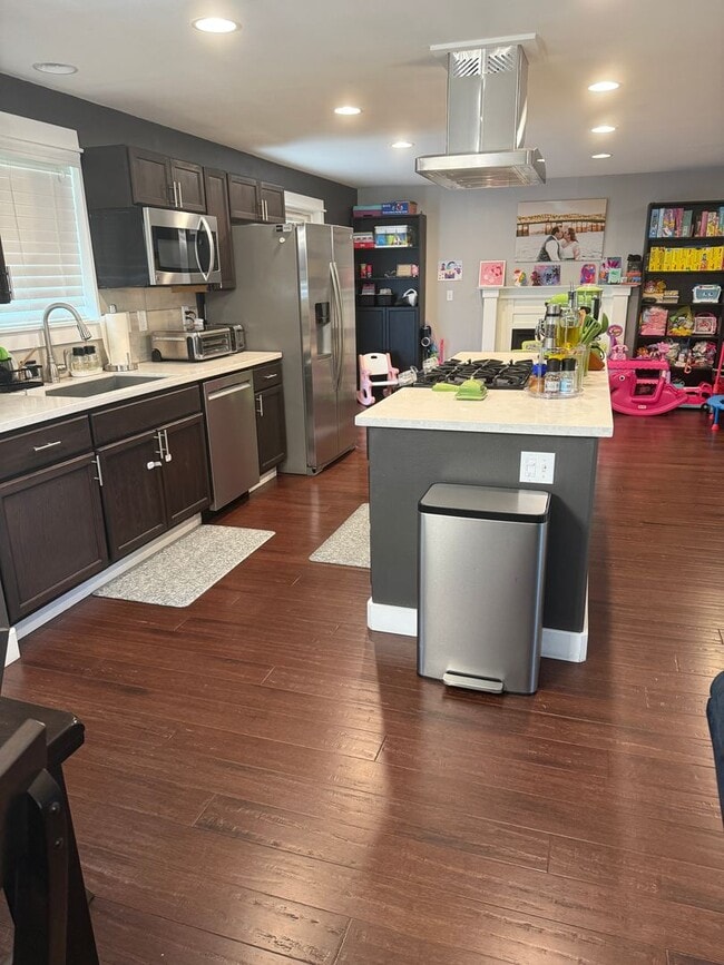 Photo - Spacious 4-bdrm/2.5-bath Hillsboro home. Fenced yard w/ covered deck, 2-car garage, great location