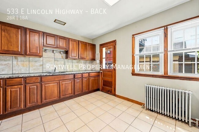 Building Photo - 533 Lincoln Hwy E Unit BACK