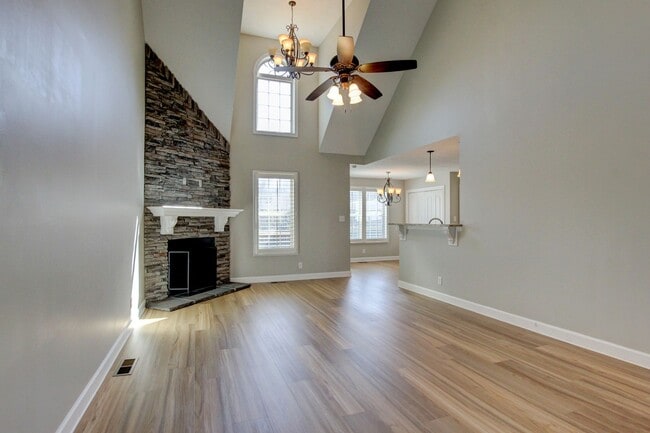 Photo - Fantastic Open Floor Plan Home With Stone Front Fireplace, Stainless Steel Appliances, And Close ...