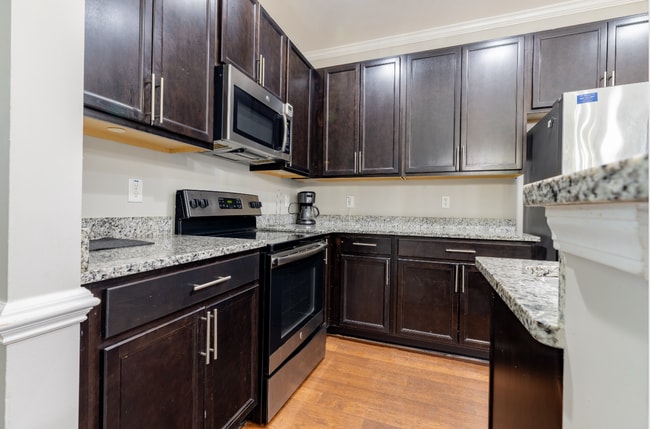 Photo - Updated 3BR Townhouse with Kitchen Island & Walk-In Closets