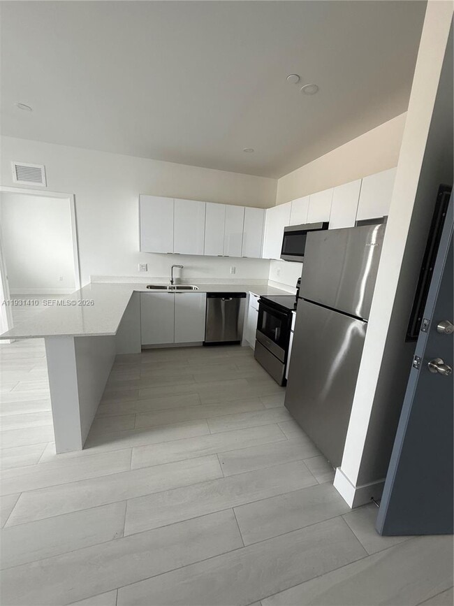 Photo - 1091 E 17th St Unit 301