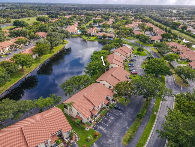 Building Photo - 10624 Tropic Palm Ave Unit 202