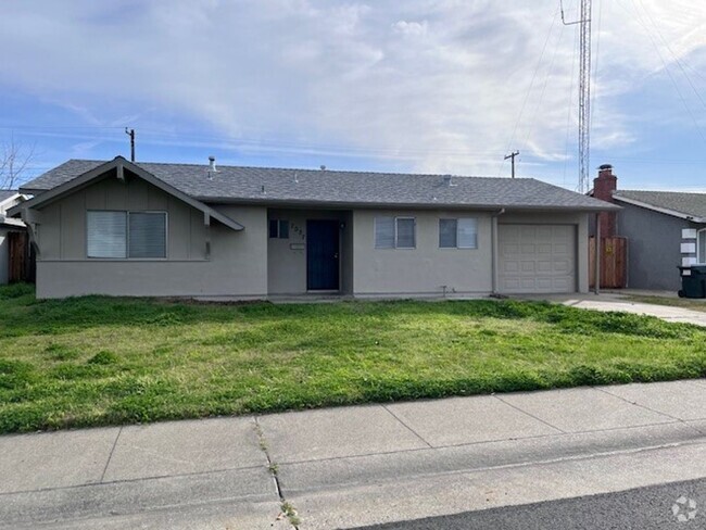 Building Photo - Freshly painted home with updated bathrooms