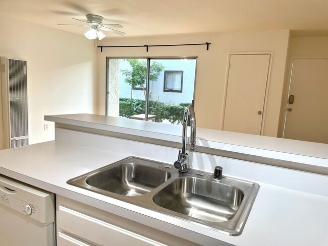 Photo - Beautiful 1 Bed/1 Bath Condo Apartment with Private Patio, Hardwood Flooring, Pool, and AC