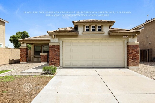 Building Photo - 1525 S 121st Dr