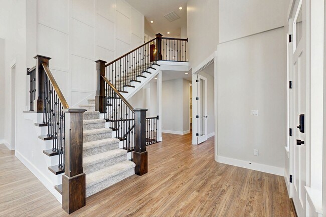 Photo - High-End Spacious 4 Bedroom Home in Desirable Highland with Private Backyard and Finished Basement