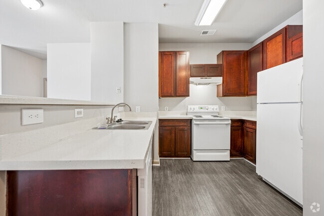 3BR, 2BA - 1,204SF - Kitchen - Candler Forrest Apartments