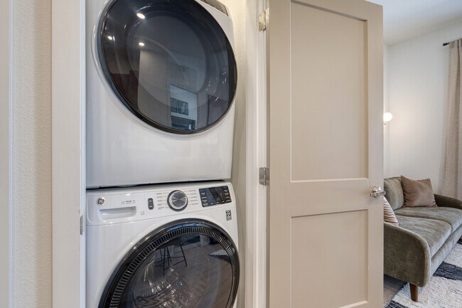Premium in-home washer and dryer for added convenience at Sageland Flats at Brooks