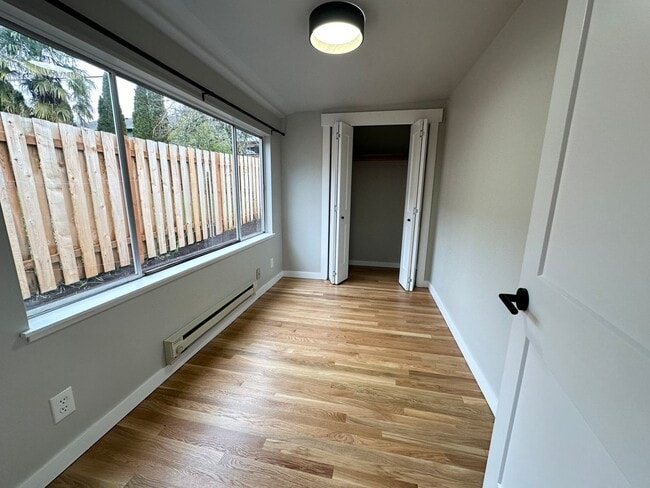 Photo - 1/2 Month Free! Sun-Filled 3-Bedroom Ranch with Wood Flooring, A/C, Updated Kitchen & 2-Car Garage!