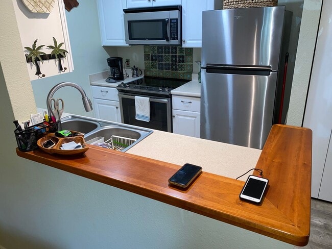 Photo - Nicely Furnished, tastefully remodeled, downstairs Kihei Villages with 2 designated parking spaces Unit 20-101