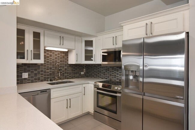 Building Photo - 6363 Christie Ave Unit 602