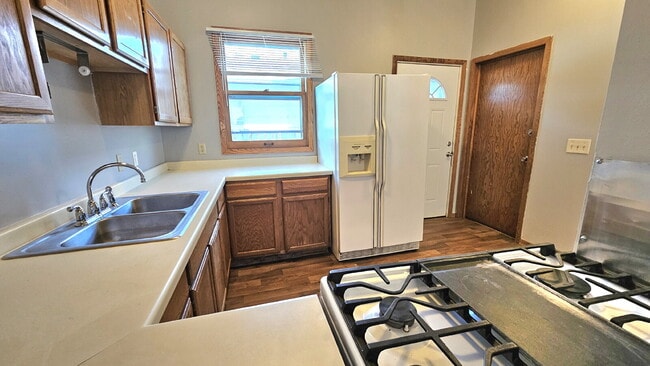 "Charming 3-Bedroom Retreat with 1200 Sq Ft of Comfort in Harrison Neighborhood in Minneapolis!"