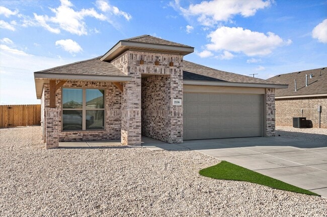 Building Photo - Space, Style & Convenience!