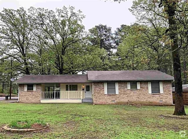Building Photo - 3/2 with fenced yard and covered parking Rental