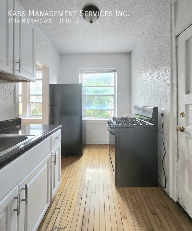 Building Photo - 1916 N Drake Ave Unit 1916-1E Rental