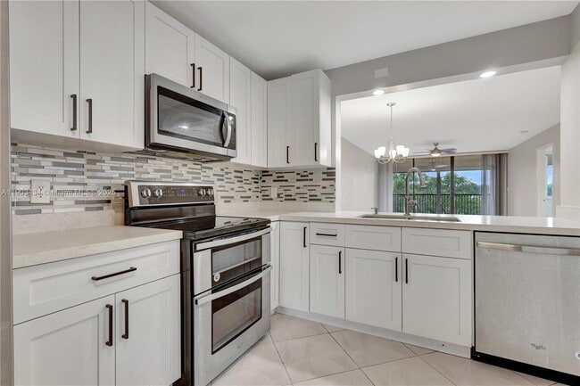 Building Photo - 8592 W Sunrise Blvd Unit 317