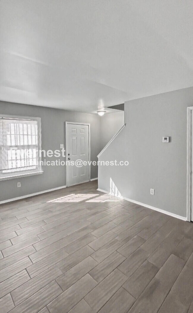 Photo - Townhome with Modern Amenities and Off-Street Parking