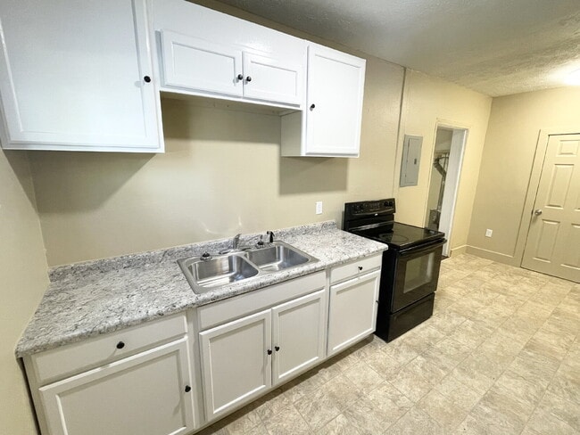 Photo - 2 Bedroom with open-concept living areas