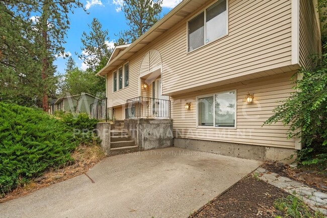 Photo - Charming 4-Bedroom Home with Garage & Spacious Yard!