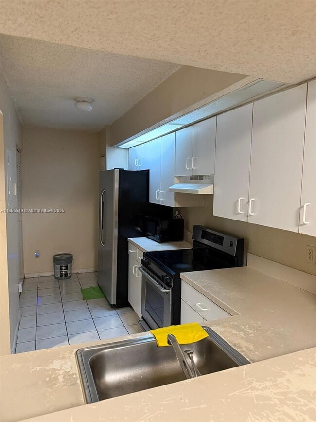 Photo - 18840 NW 57th Ave Unidad 105