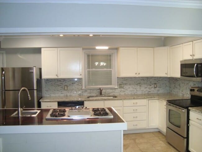 Photo - Renovated 4 bedroom available now to rent!