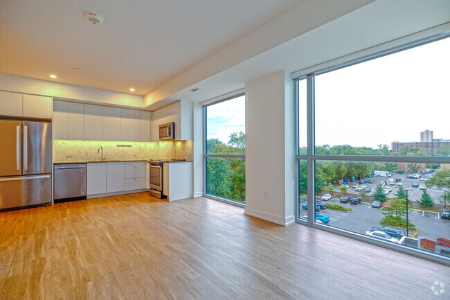 2BR, 2BA - 908SF - Kitchen/Living - The Huron