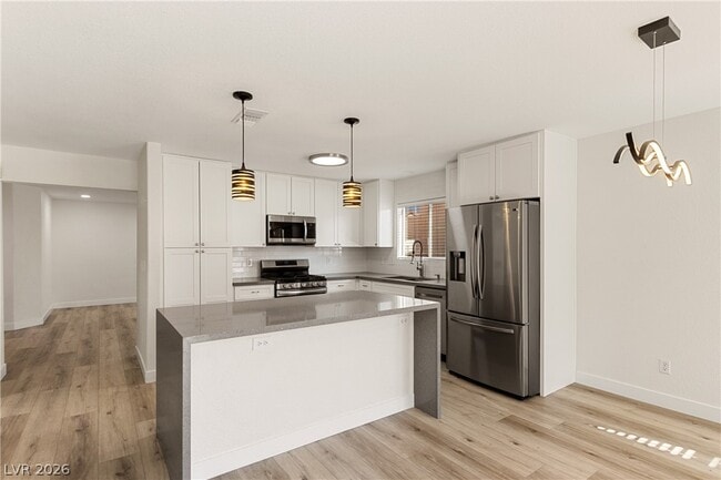 Building Photo - 9813 Camino Loma Verde Ave