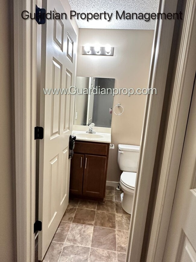 Photo - Champlin Town Home, 2 Car Garage, Dishwasher, Washer/Dryer, Balcony, July/Aug 1st Move In