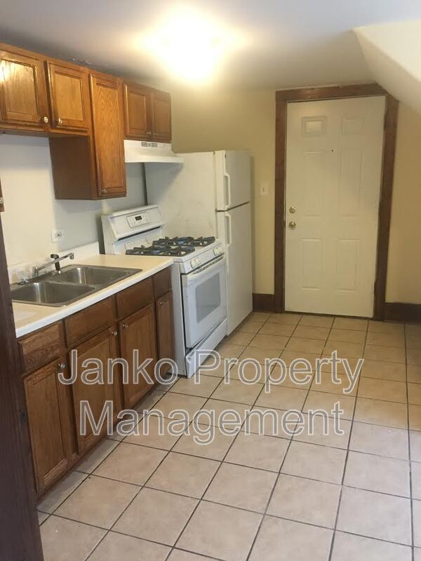 Building Photo - 2855 E 82nd St Unit 3F