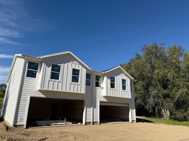 Photo - Half off first months rent - Beautiful townhome with 2 car garage, Central Air and Master Suite