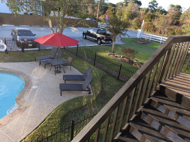 Ocio junto a la piscina - Tomball Ranch Apartments