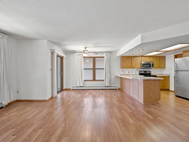 Photo - Spacious 2BR Rental with Open Floor Plan & Low-Maintenance yard