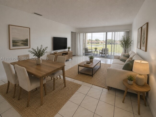 Building Photo - 7410 Woodmont Terrace Unit 204