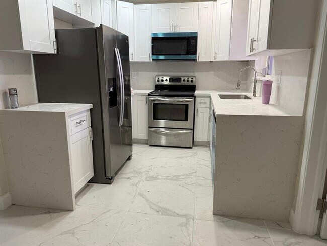 Building Photo - 841 NW 39th St Unit 3 Rental