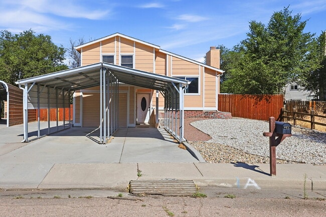 Building Photo - $1,645.95, 2 bed, 1 bath located in Colorado Springs with a large fenced backyard.